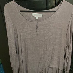 Light brown maybe, long bohemian dress! Really cool cuts in it!